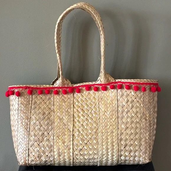 Handwoven Natural Straw Tote with Red Pom-Pom Trim - Picture 1 of 6